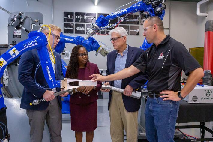 Ohio State's HAMMER ERC leaders in the Artificially Intelligent Manufacturing Systems (AIMS) Lab, (l to r) Prof. Mike Groeber, Dean Ayanna Howard, Prof. Glenn Daehn and CDME Exec. Director Nate Ames.