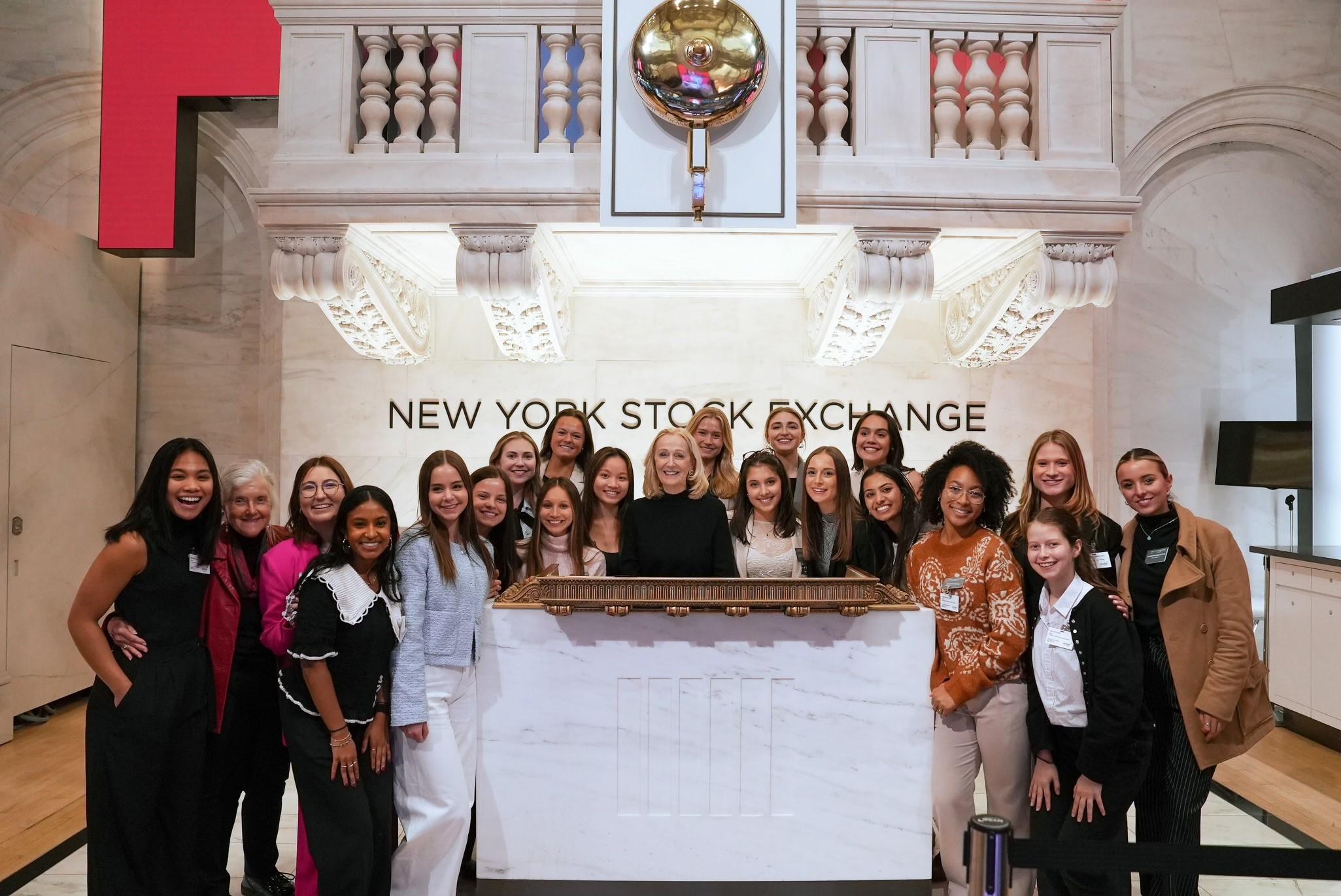 A group of young women at the New York Stock Exchange.