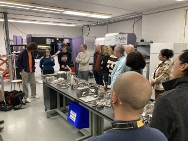 Group of people in a manufacturing lab